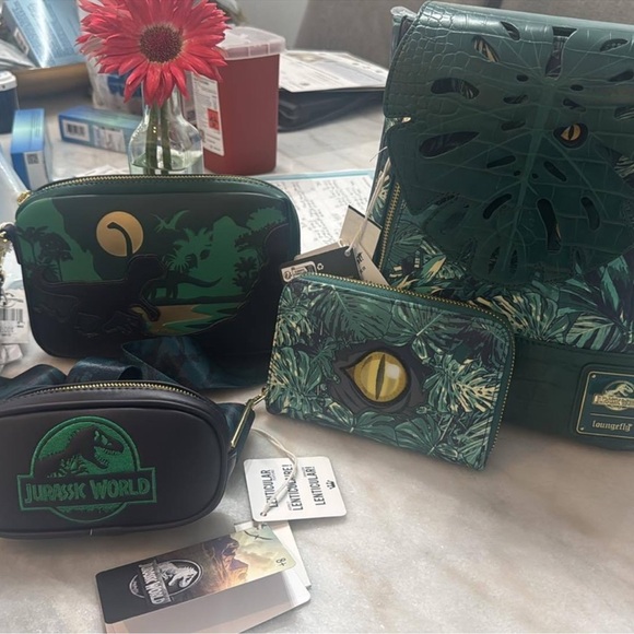 Loungefly Handbags - Loungefly Jurassic World Velociraptor Palm Mini backpack, Wallet, & Sling Bag